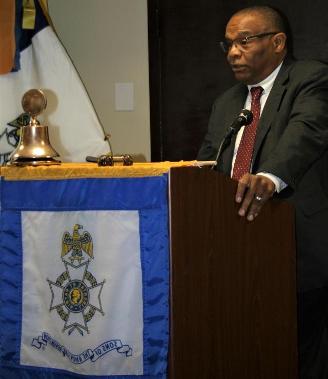 Dr. Donald Gladney speaking at the March meeting.