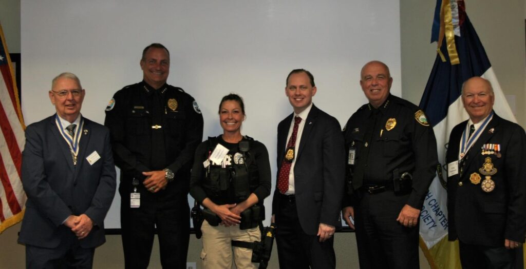 Chapter leaders and law enforcement medal recipients at the April meeting.